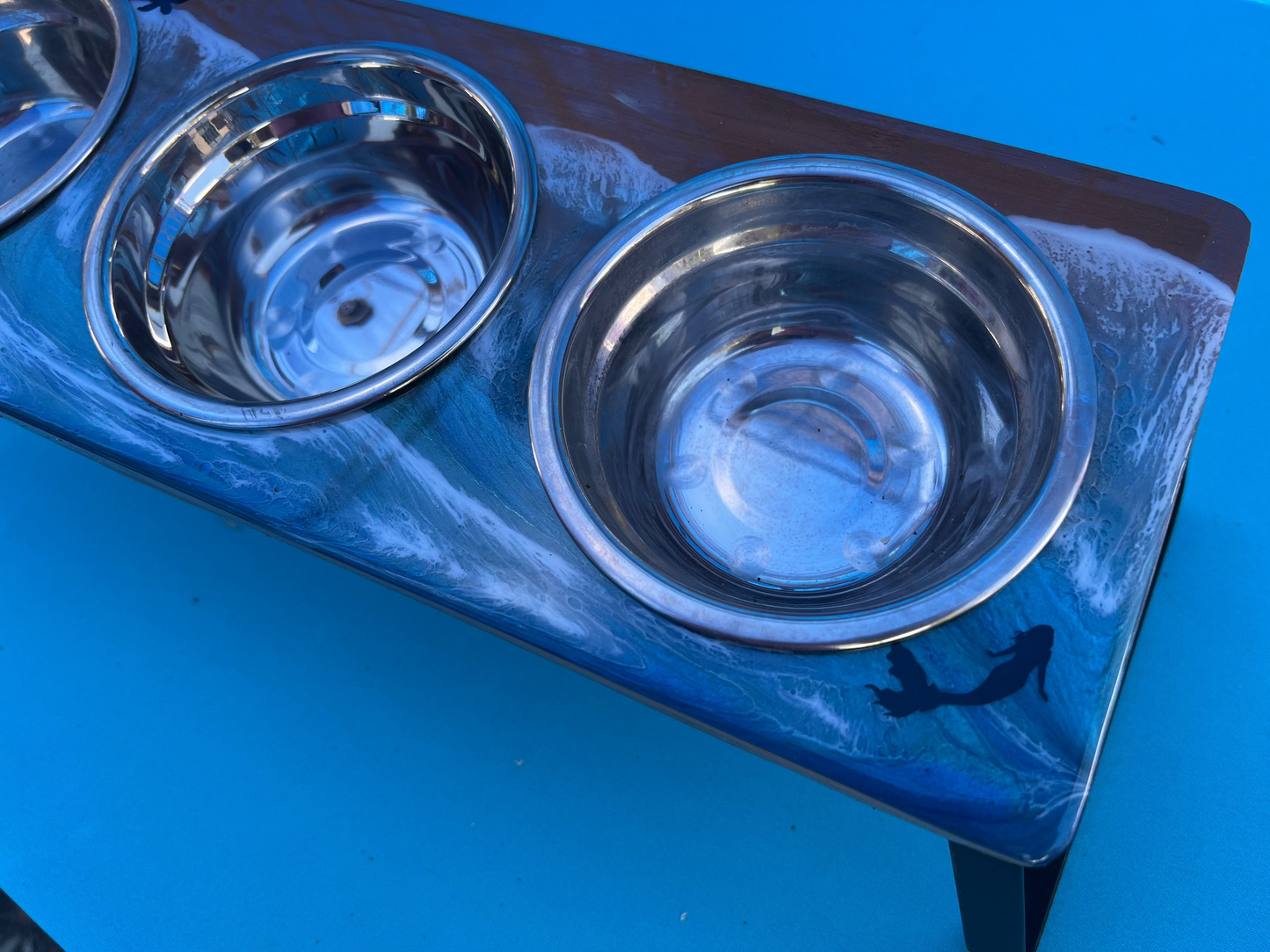 small dog bowl with mermaid exploring the corner of the ocean